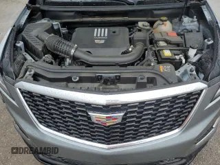 2023 Cadillac XT5 FWD Luxury z VIN 1GYKNAR47PZ144988, wystawiony jako Copart lot #50830365 z przebiegiem 17 687 mil mil oraz Szkody całkowita. Historia ofert i sprzedaży dostępna na DreamBid. Obrazek 12.