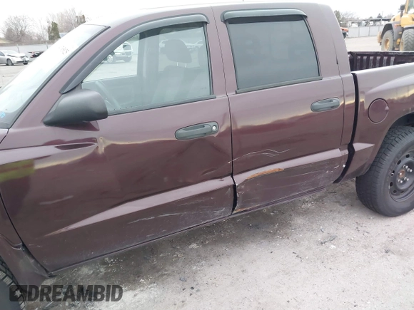 2005 Dodge Dakota SLT with VIN 1D7HW48N95S298672, listed as a IAAI auction lot 41765025 with 291,447 mi miles. Bid and sale history available at carsss.com. Image 6.