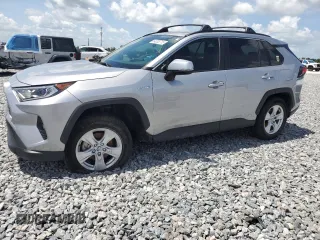 2021 Toyota RAV4 Hybrid XLE with VIN JTMRWRFV2MD113279, listed as a Copart auction lot 64038715 with 28,452 mi miles and Salvage title. Bid and sale history available at DreamBid. Image 1.