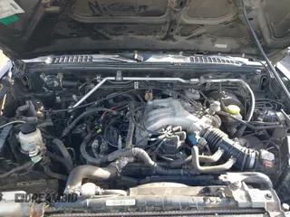 2004 Nissan Xterra XE with VIN 5N1ED28Y74C602510, listed as a IAAI auction lot 41353881 with 247,695 mi miles and . Bid and sale history available at carsss.com. Image 10.
