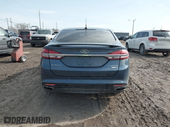 2018 Ford Fusion Titanium with VIN 3FA6P0D94JR187880, listed as a IAAI auction lot 41690869 with 120,214 mi miles and . Bid and sale history available at DreamBid. Image 16.