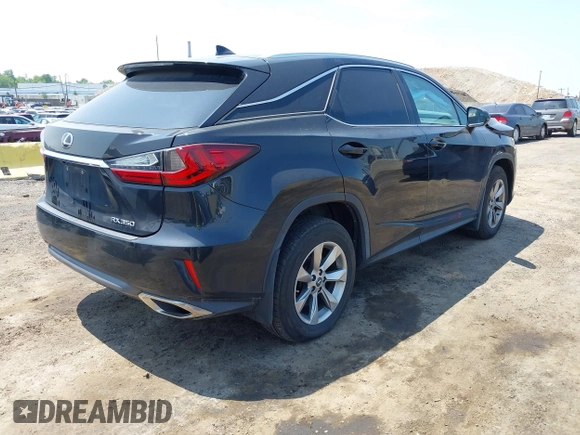 2019 Lexus RX 350 with VIN 2T2BZMCA5KC193082, listed as a IAAI auction lot 42400440 with 80,405 mi miles and . Bid and sale history available at DreamBid. Image 4.
