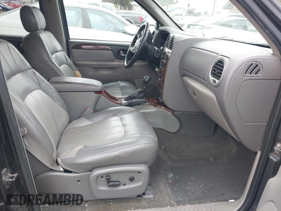 2003 GMC Envoy SLT z VIN 1GKDS13S232298062, wystawiony jako IAAI lot #41668380 z przebiegiem 195 045 mil mil oraz . Historia ofert i sprzedaży dostępna na DreamBid. Obrazek 5.