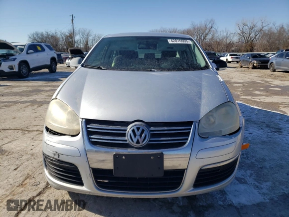 2007 Volkswagen Jetta z VIN 3VWHG71K27M111595, wystawiony jako Copart lot #42016995 z przebiegiem 155 565 mil mil oraz Czysty tytuł • Clean title. Historia ofert i sprzedaży dostępna na DreamBid. Obrazek 5.