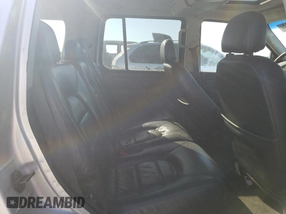 2003 Ford Explorer z VIN 1FMDU75K13ZB02783, wystawiony jako Copart lot #72840324 z przebiegiem Nie podano mil oraz Szkoda całkowita • Salvage title. Historia ofert i sprzedaży dostępna na DreamBid. Obrazek 11.