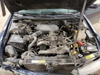 1998 Subaru Legacy Outback with VIN 4S3BG6850W7601142, listed as a Copart auction lot 57319505 with 227,489 mi miles and Salvage title. Bid and sale history available at DreamBid. Image 12.