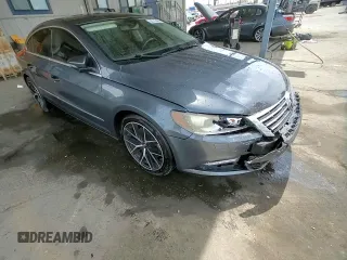2013 Volkswagen CC Sport z VIN WVWBP7AN2DE507286, wystawiony jako Copart lot #56715485 z przebiegiem 132 314 mil mil oraz Szkoda całkowita • Salvage title. Historia ofert i sprzedaży dostępna na DreamBid. Obrazek 13.