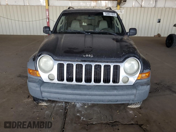 2005 Jeep Liberty Sport with VIN 1J4GK48K45W664323, listed as a Copart auction lot 53851855 with 323,695 mi miles and Salvage Title. Bid and sale history available at DreamBid. Image 5.