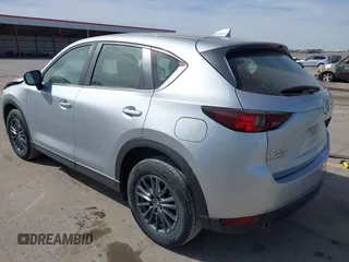 2019 Mazda CX-5 Sport with VIN JM3KFBBM6K1582760, listed as a IAAI auction lot 41822152 with 60,620 mi miles and . Bid and sale history available at DreamBid. Image 3.