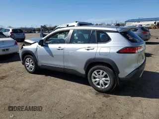 2022 Toyota Corolla Cross L with VIN 7MUAAABG0NV011057, listed as a Copart auction lot 50907545 with 59,328 mi miles and Salvage title. Bid and sale history available at DreamBid. Image 2.