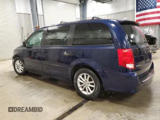 2014 Dodge Grand Caravan SXT z VIN 2C4RDGCG7ER274497, wystawiony jako Copart lot #49851495 z przebiegiem 130 309 mil mil oraz Czysty tytuł • Clean title. Historia ofert i sprzedaży dostępna na DreamBid. Obrazek 2.