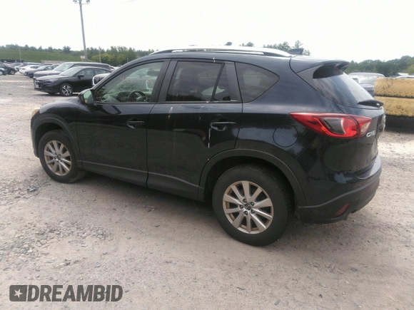 2014 Mazda CX-5 Touring z VIN JM3KE2CYXE0429149, wystawiony jako IAAI lot #42471772 z przebiegiem 222 440 mil mil oraz . Historia ofert i sprzedaży dostępna na DreamBid. Obrazek 3.