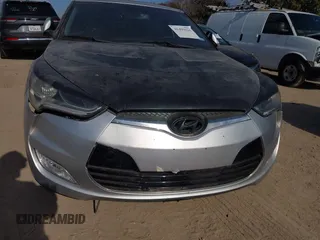 2012 Hyundai Veloster w/Gray Int with VIN KMHTC6AD0CU068400, listed as a IAAI auction lot 41493521 with 72,682 mi miles and . Bid and sale history available at DreamBid. Image 6.