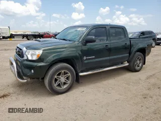 2014 Toyota Tacoma PreRunner with VIN 3TMJU4GN4EM165832, listed as a Copart auction lot 61989845 with 104,390 mi miles and Salvage title. Bid and sale history available at DreamBid. Image 1.