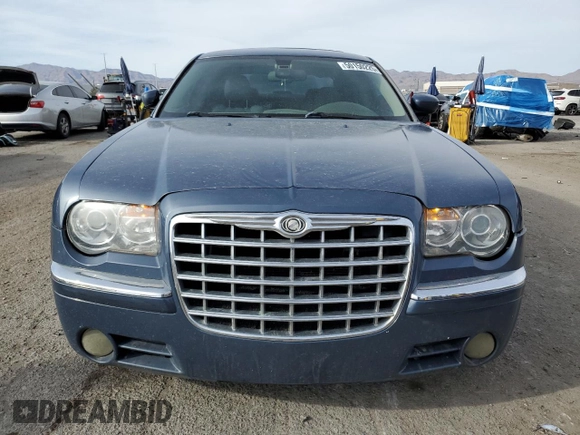 2007 Chrysler 300 C z VIN 2C3KA63H57H790772, wystawiony jako Copart lot #50150225 z przebiegiem 187 800 mil mil oraz Szkoda całkowita • Salvage title. Historia ofert i sprzedaży dostępna na DreamBid. Obrazek 5.