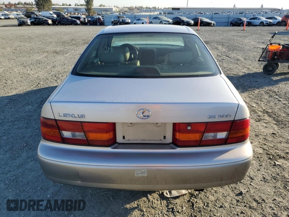 1998 Lexus ES 300 Luxury Sport Sdn with VIN JT8BF28G6W5019411, listed as a Copart auction lot 77497114 with 167,288 mi miles and Salvage Title. Bid and sale history available at carsss.com. Image 6.