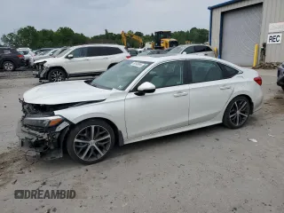 2022 Honda Civic Touring with VIN 2HGFE1F90NH316963, listed as a Copart auction lot 58190995 with 145,598 mi miles and Salvage title. Bid and sale history available at DreamBid. Image 1.