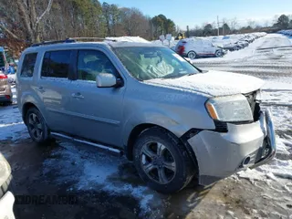 2015 Honda Pilot SE with VIN 5FNYF4H33FB064910, listed as a IAAI auction lot 41357315 with 115,879 mi miles and . Bid and sale history available at carsss.com. Image 1.