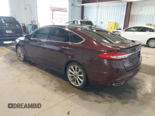 2017 Ford Fusion Titanium with VIN 3FA6P0K91HR171231, listed as a IAAI auction lot 41131312 with 115,265 mi miles. Bid and sale history available at carsss.com. Image 3.