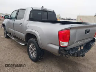 2017 Toyota Tacoma SR5 with VIN 5TFAZ5CN6HX030668, listed as a IAAI auction lot 41429982 with 92,565 mi miles and . Bid and sale history available at carsss.com. Image 3.