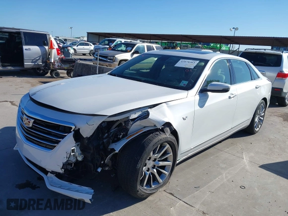 2018 Cadillac CT6 Luxury AWD z VIN 1G6KD5RS9JU151575, wystawiony jako IAAI lot #42078361 z przebiegiem 28 187 mil mil oraz . Historia ofert i sprzedaży dostępna na DreamBid. Obrazek 2.