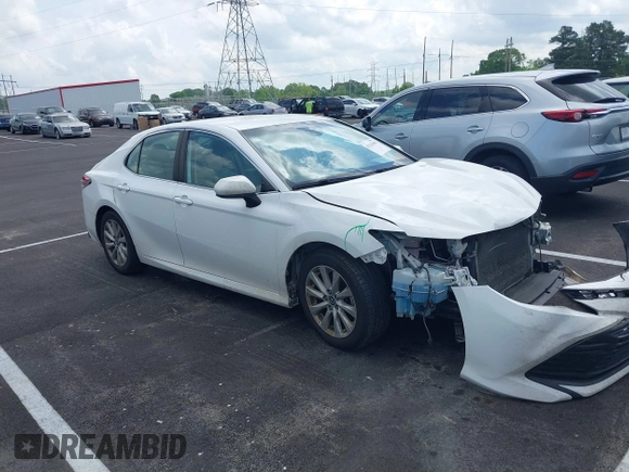 2019 Toyota Camry LE with VIN 4T1B11HK2KU743445, listed as a IAAI auction lot 42129688 with 284,938 mi miles and . Bid and sale history available at DreamBid. Image 1.