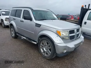 2008 Dodge Nitro SLT with VIN 1D8GT58K58W127412, listed as a IAAI auction lot 41544874 with 232,748 mi miles. Bid and sale history available at carsss.com. Image 1.