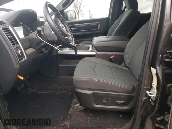 2023 Ram 1500 Classic SLT with VIN 1C6RR7GG0PS556467, listed as a Copart auction lot 83797344 with 7,653 mi miles and Salvage Title. Bid and sale history available at carsss.com. Image 7.