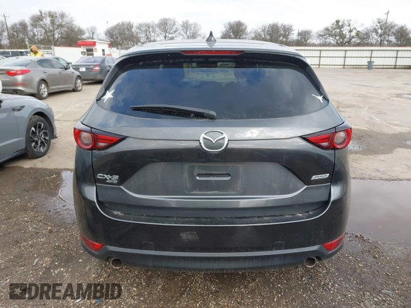 2018 Mazda CX-5 Grand Touring with VIN JM3KFBDM8J0441867, listed as a IAAI auction lot 41565147 with 62,466 mi miles. Bid and sale history available at carsss.com. Image 17.