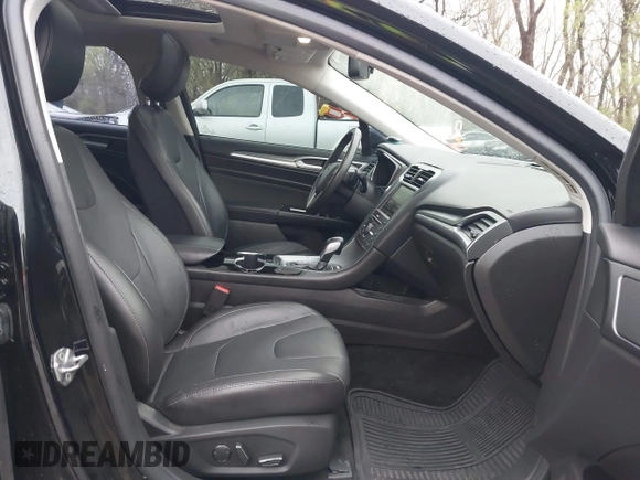 2016 Ford Fusion Titanium with VIN 3FA6P0K90GR273795, listed as a IAAI auction lot 41931175 with 108,531 mi miles and . Bid and sale history available at carsss.com. Image 5.