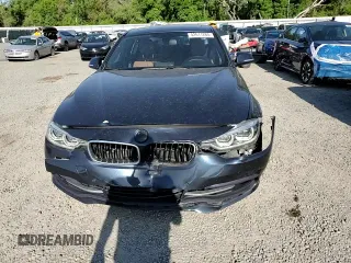 2017 BMW 3 Series 330i xDrive with VIN WBA8D9C38HA005368, listed as a Copart auction lot 52611265 with 106,972 mi miles and Salvage title. Bid and sale history available at DreamBid. Image 11.