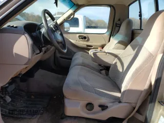 1999 Ford F-150 XL с VIN 1FTRF17L2XKA36749, выставлен на аукционе Copart как лот 84671444 с пробегом 148 338 миль миль и Списание • Salvage title. История ставок и продаж доступна на DreamBid. Изображение 7.