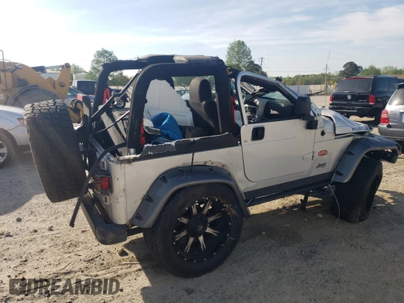 2003 Jeep Wrangler Rubicon z VIN 1J4FA69S53P375189, wystawiony jako Copart lot #54292035 z przebiegiem 55 863 mil mil oraz Szkoda całkowita • Salvage title. Historia ofert i sprzedaży dostępna na DreamBid. Obrazek 3.