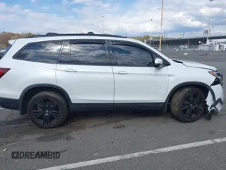 2021 Honda Pilot Black Edition z VIN 5FNYF6H72MB067664, wystawiony jako IAAI lot #42025998 z przebiegiem 52 791 mil mil oraz . Historia ofert i sprzedaży dostępna na DreamBid. Obrazek 13.