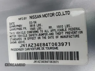 2004 Nissan 350Z Touring z VIN JN1AZ34E84T063971, wystawiony jako Copart lot #57267825 z przebiegiem 131 036 mil mil oraz Szkoda całkowita • Salvage title. Historia ofert i sprzedaży dostępna na DreamBid. Obrazek 12.