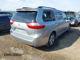 2016 Toyota Sienna LE AAS with VIN 5TDKK3DC2GS750211, listed as a IAAI auction lot 41444073 with 120,185 mi miles. Bid and sale history available at carsss.com. Image 4.