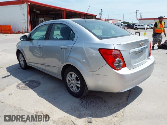 2014 Chevrolet Sonic LT with VIN 1G1JC5SH0E4210327, listed as a IAAI auction lot 42069313 with 94,506 mi miles and . Bid and sale history available at DreamBid. Image 3.