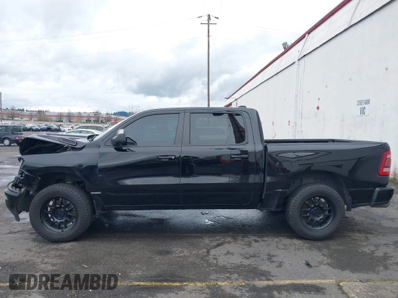 2019 Ram 1500 Big Horn/Lone Star with VIN 1C6SRFFT9KN625013, listed as a IAAI auction lot 41611276 with 100,463 mi miles. Bid and sale history available at carsss.com. Image 15.