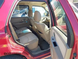 2006 Mercury Mariner Convenience with VIN 4M2YU56Z86KJ00414, listed as a IAAI auction lot 41251382 with 226,013 mi miles and . Bid and sale history available at DreamBid. Image 8.