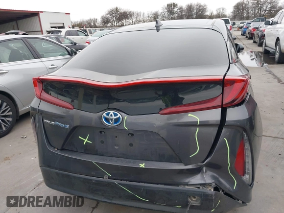 2018 Toyota Prius Plus with VIN JTDKARFPXJ3087064, listed as a IAAI auction lot 41433495 with 118,298 mi miles and . Bid and sale history available at DreamBid. Image 16.