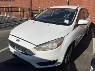 2017 Ford Focus SE with VIN 1FADP3F21HL223218, listed as a IAAI auction lot 42273348 with 180,448 mi miles and . Bid and sale history available at DreamBid. Image 3.