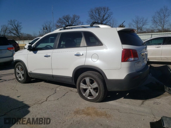 2012 Kia Sorento EX z VIN 5XYKUDA23CG291368, wystawiony jako Copart lot #42061635 z przebiegiem 134 472 mil mil oraz Szkoda całkowita • Salvage title. Historia ofert i sprzedaży dostępna na DreamBid. Obrazek 2.