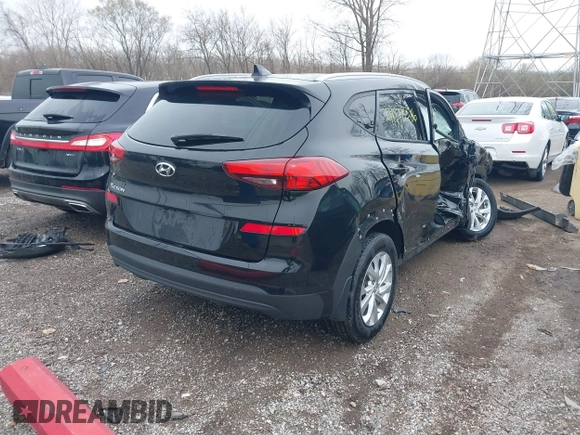 2021 Hyundai Tucson Value with VIN KM8J33A47MU359385, listed as a IAAI auction lot 41878386 with 84,991 mi miles and . Bid and sale history available at DreamBid. Image 4.