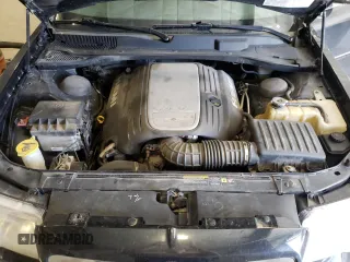 2005 Chrysler 300 C z VIN 2C3JA63H55H119210, wystawiony jako Copart lot #54727045 z przebiegiem 148 202 mil mil oraz Szkoda całkowita • Salvage title. Historia ofert i sprzedaży dostępna na DreamBid. Obrazek 11.