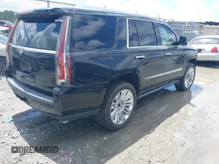 2019 Cadillac Escalade Platinum with VIN 1GYS4DKJ9KR138333, listed as a IAAI auction lot 42523430 with 104,787 mi miles and . Bid and sale history available at DreamBid. Image 4.