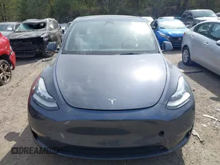 2022 Tesla Model Y Long Range z VIN 7SAYGDEE2NF447998, wystawiony jako IAAI lot #41704968 z przebiegiem 34 088 mil mil oraz . Historia ofert i sprzedaży dostępna na DreamBid. Obrazek 12.