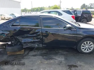 2017 Toyota Camry XLE z VIN 4T1BF1FK0HU403059, wystawiony jako IAAI lot #42112842 z przebiegiem 99 782 mil mil oraz . Historia ofert i sprzedaży dostępna na DreamBid. Obrazek 13.