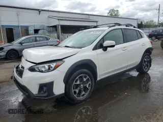 2018 Subaru Crosstrek Premium z VIN JF2GTADC6J8228511, wystawiony jako Copart lot #56350525 z przebiegiem 136 300 mil mil oraz Szkoda całkowita • Salvage title. Historia ofert i sprzedaży dostępna na DreamBid. Obrazek 1.