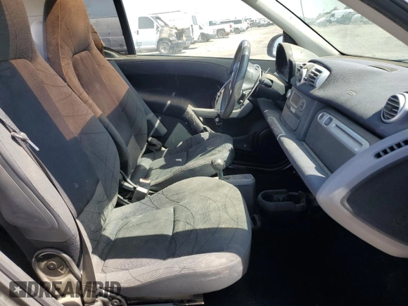 2014 Smart fortwo Pure z VIN WMEEJ3BA6EK745679, wystawiony jako Copart lot #56242784 z przebiegiem 86 991 mil mil oraz Szkoda całkowita • Salvage title. Historia ofert i sprzedaży dostępna na DreamBid. Obrazek 7.