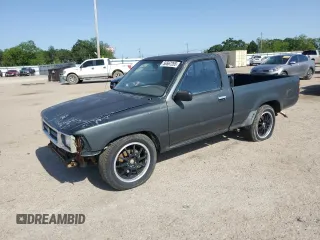 1993 Toyota Pickup with VIN 4TARN81A9PZ075148, listed as a Copart auction lot 56567265 with 169,693 mi miles and Salvage title. Bid and sale history available at DreamBid. Image 1.